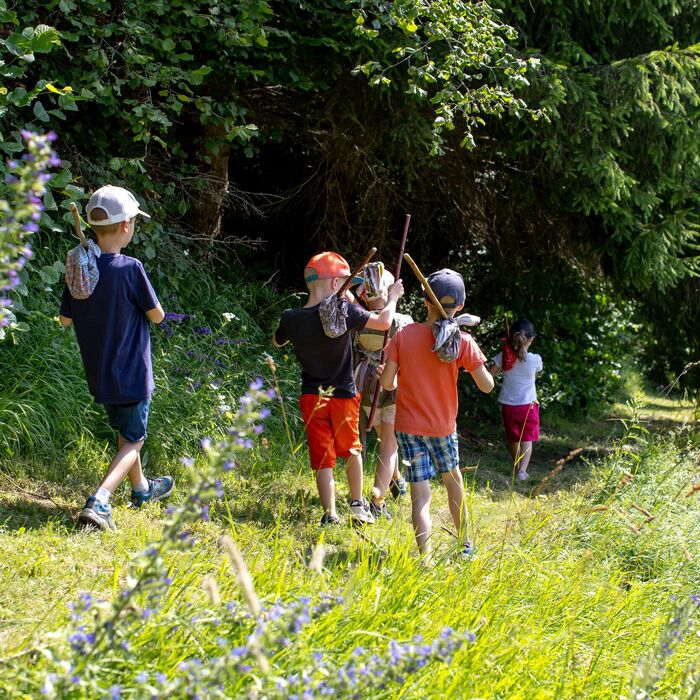 Family on the “Hans im Glück” adventure hiking trail in Zirbitzkogel Grebenzen Nature Park