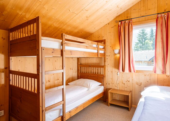 Schlafzimmer Alpendorf Dachstein West