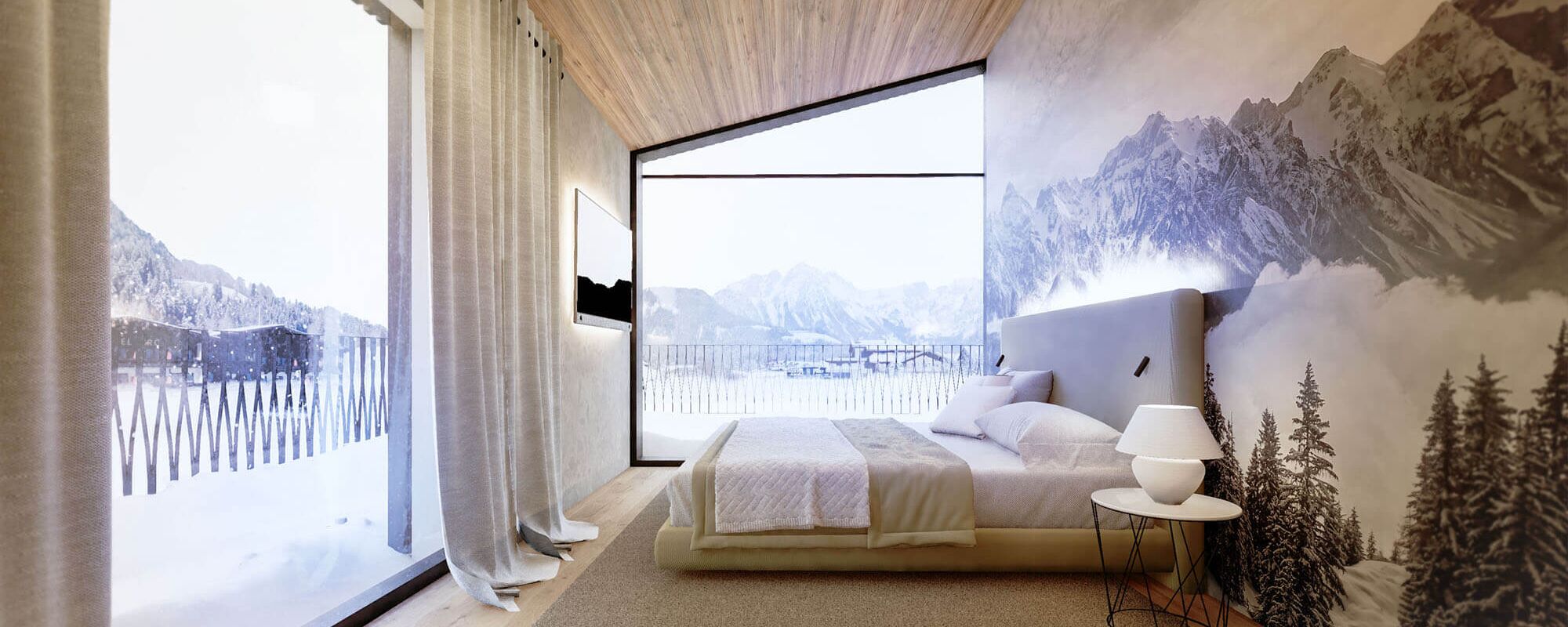 Ein modernes Schlafzimmer mit Blick auf schneebedeckte Berge und großen Fenstern, die viel Tageslicht hereinlassen.