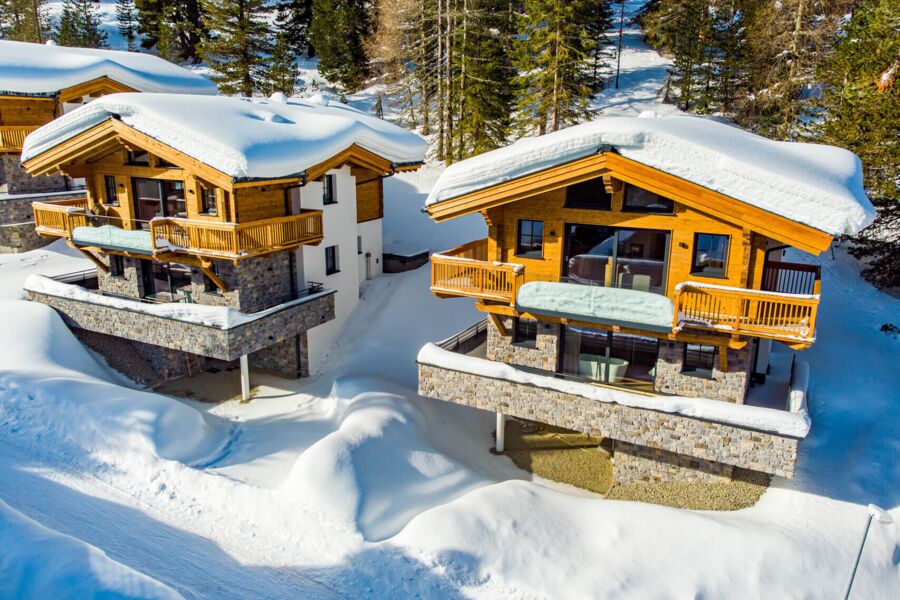 Buitenaanzicht in de winter   Turrach Lodges by ALPS RESORTS