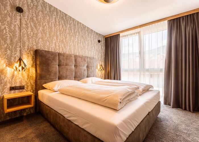 Slaapkamer   Zillertal Suites Fügen by ALPS RESORTS