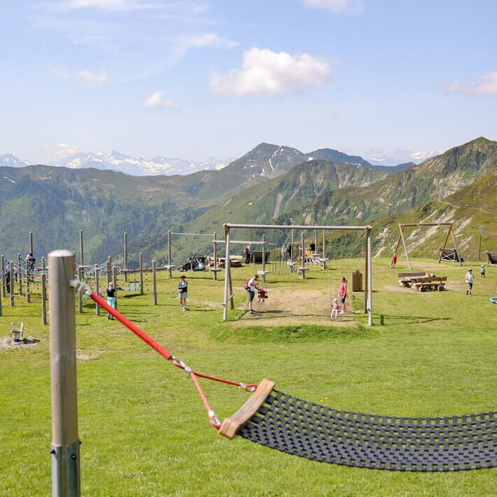 Mountain playground in Saalbach with children playing