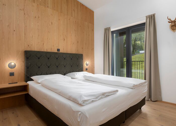 Slaapkamer Bergresort Berwanger Hof