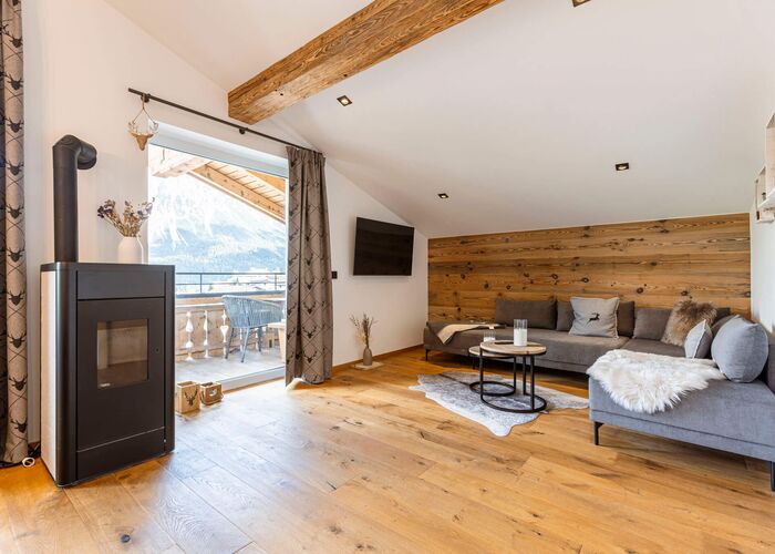 Woonkamer   Zugspitz Suites Lermoos