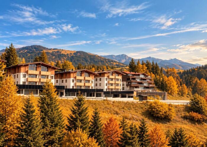 Bergresort Tauernblick surrounded by autumn forests and mountains