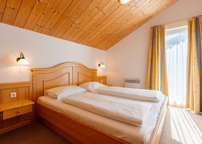 Schlafzimmer Alpendorf Dachstein West