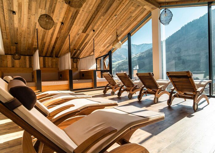 Peaceful wellness relaxation area with comfortable loungers at Carpe Solem Rauris