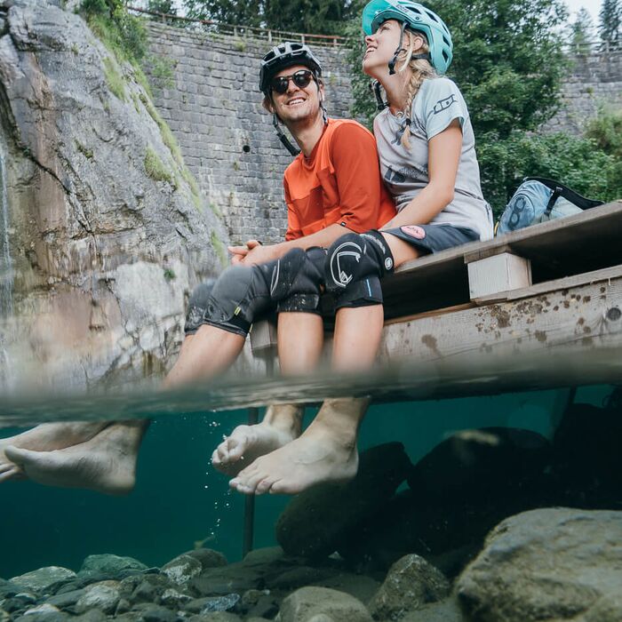 Mountain biker riding a trail on the Nassfeld adventure mountain with alpine scenery and panoramic views