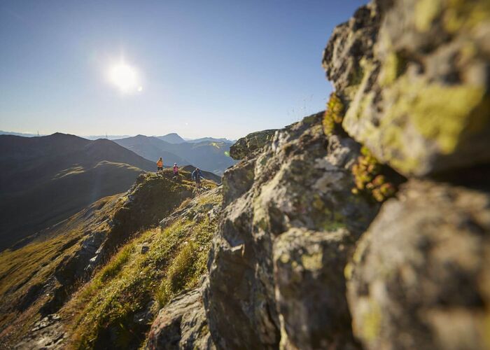 Hikers in Saalbach Hinterglemm with a view of the mountains