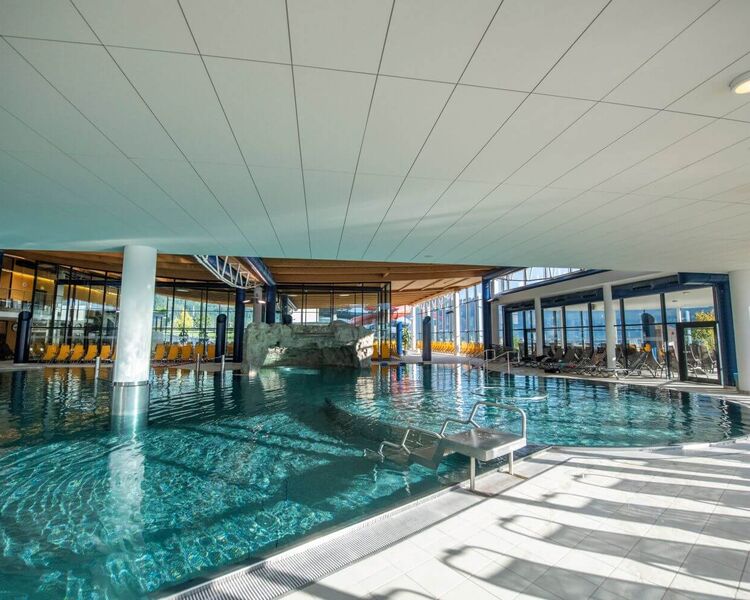 Indoor area with a large water surface in a thermal spa