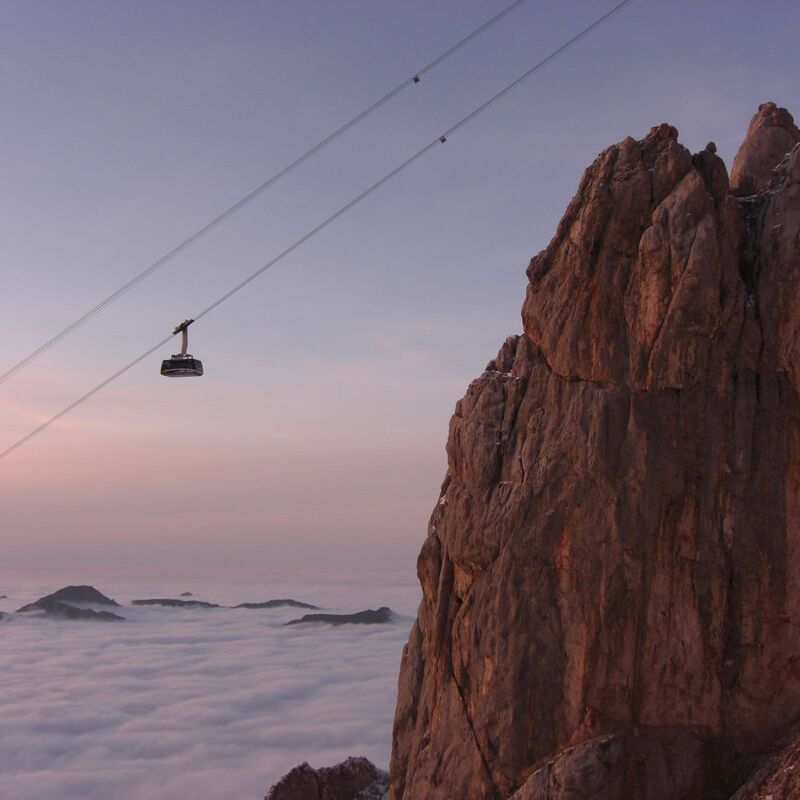 sunrise at the Zugspitze with fog and clouds
