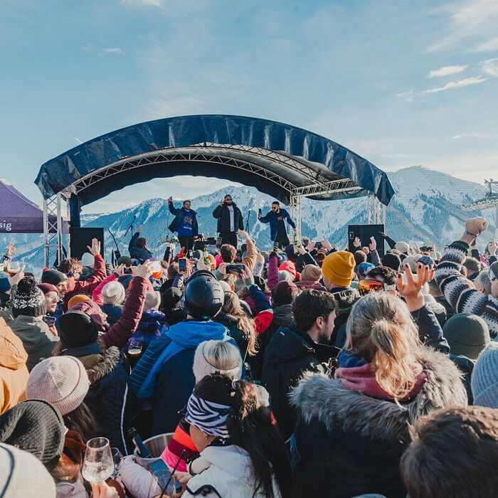 Mountain festival in Saalbach with lots of people attending