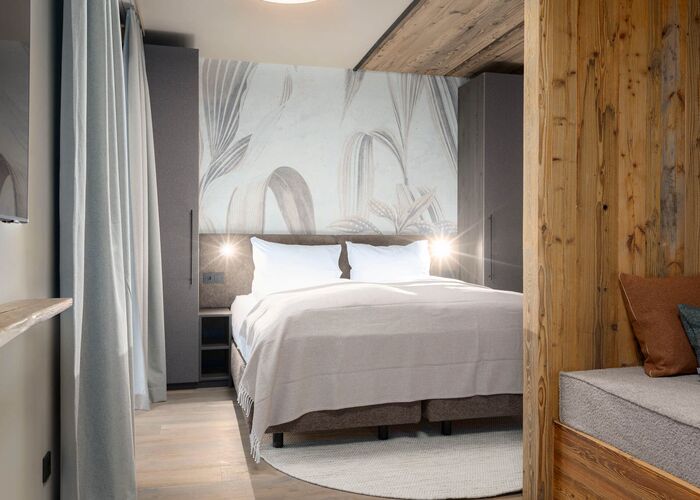 Double bed with sleeping area in the foreground