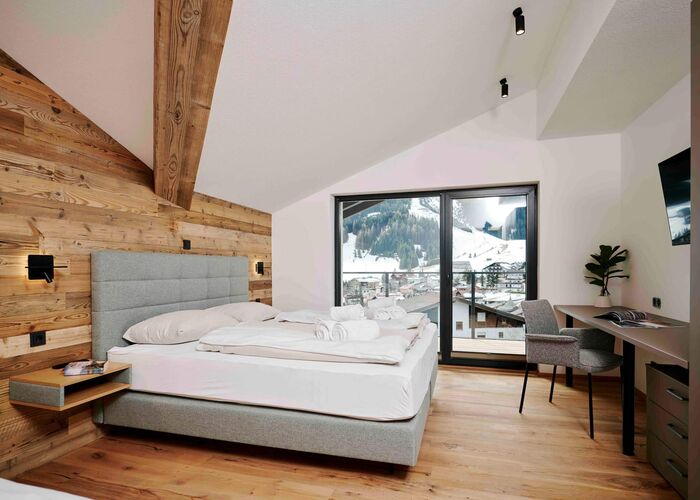 Slaapkamer   Bergresort Berwanger Hof