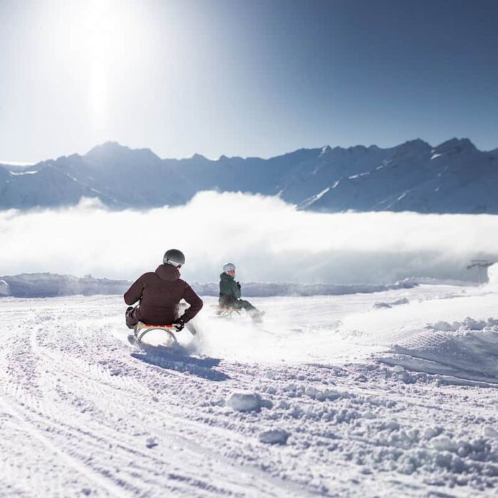 Toboggan run at the national park with a view of the mountains