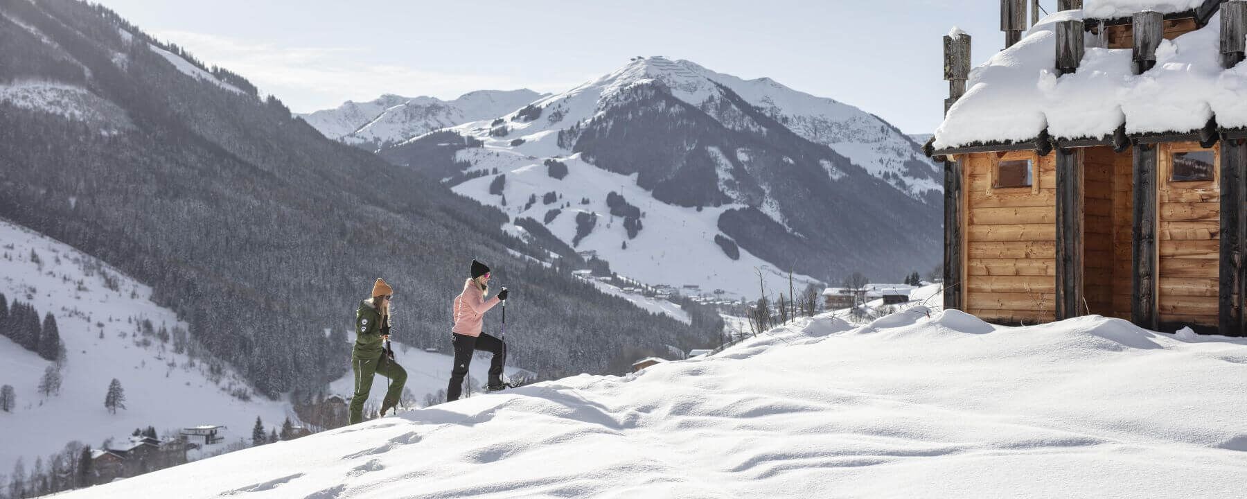 Snowshoe hiking in Saalbach Hinterglemm with views of the mountains