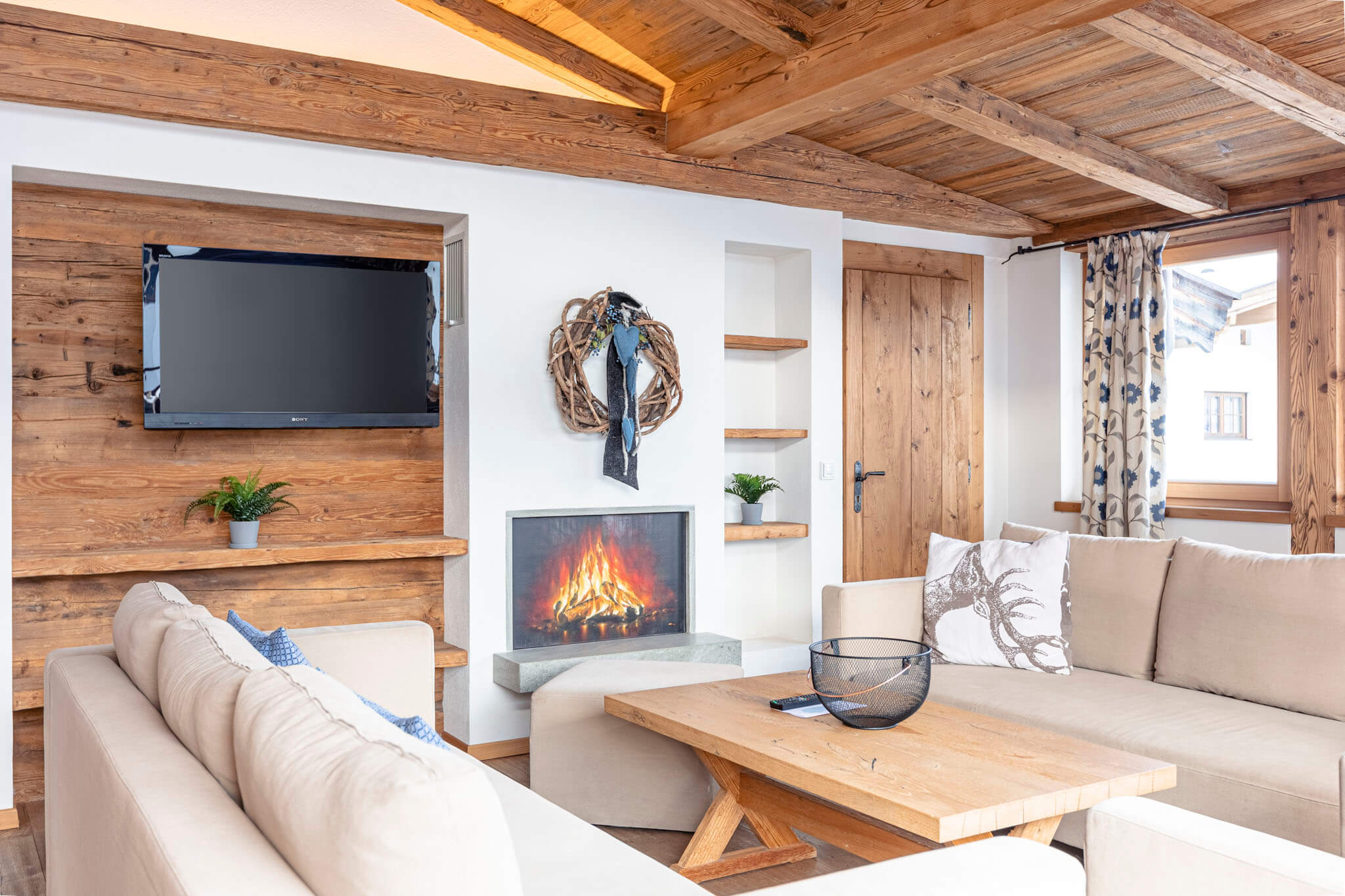 Wohnbereich Penthouse Hahnenkamm - Dorfresort Kitzbühel