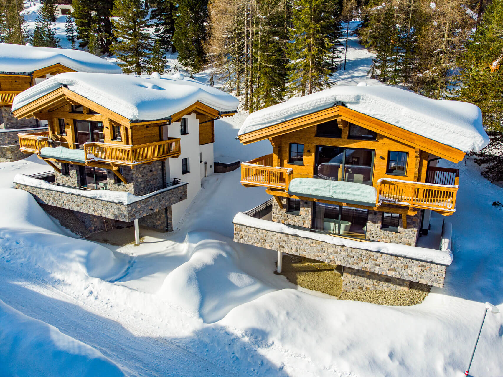 Buitenaanzicht in de winter - Turrach Lodges by ALPS RESORTS
